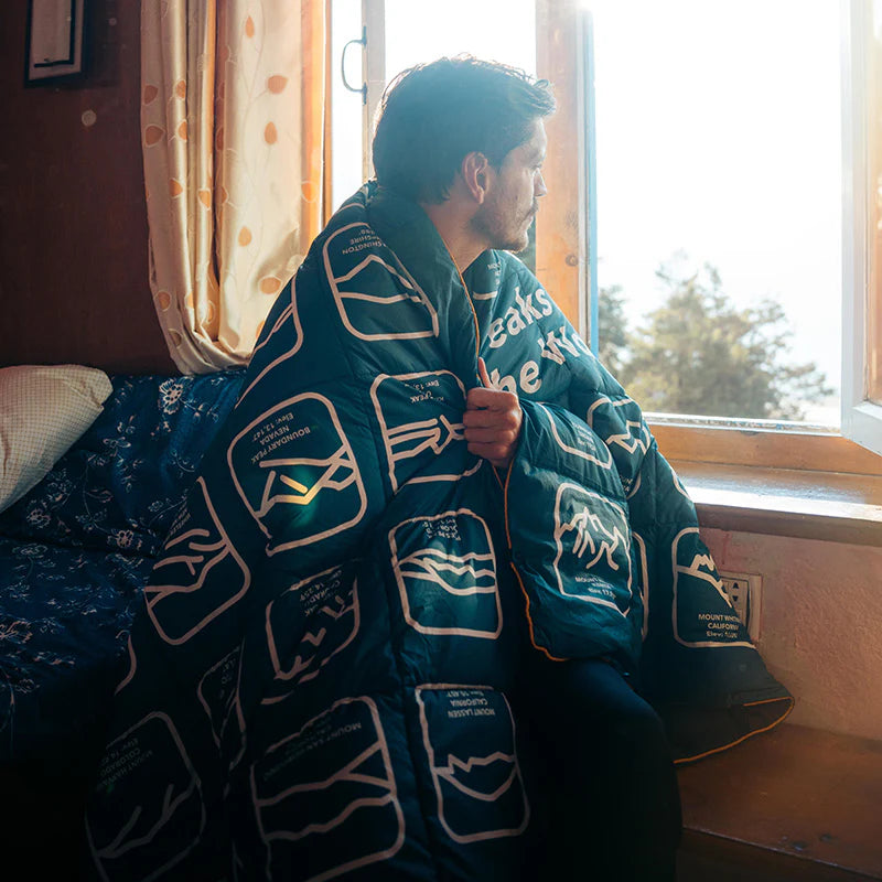 Graphene Puffer Blanket: Peaks of the World Teal Ocean Nomadix