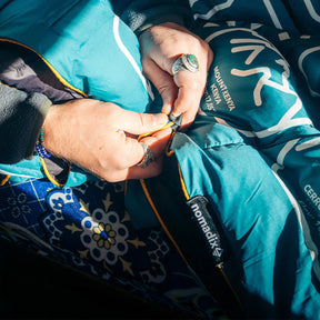 Graphene Puffer Blanket: Peaks of the World Teal Ocean Nomadix