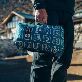Graphene Puffer Blanket: Peaks of the World Teal Ocean Nomadix