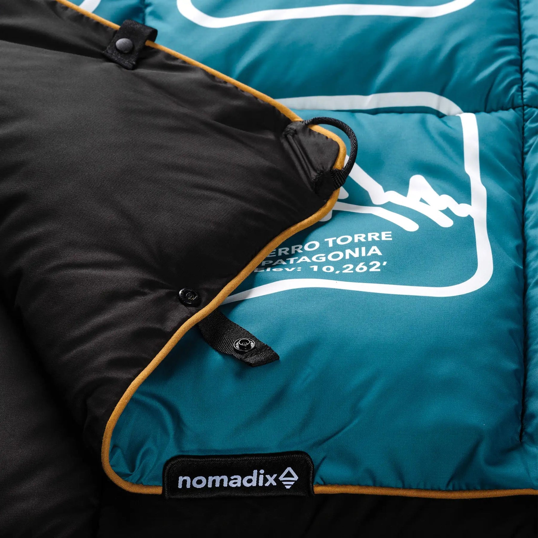 Graphene Puffer Blanket: Peaks of the World Teal Ocean Nomadix