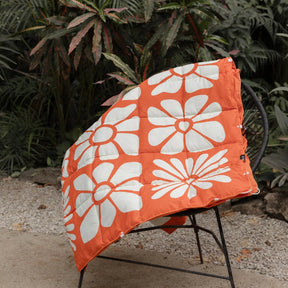 Graphene Puffer Blanket: Big Flowers Expedition Orange Nomadix