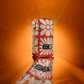 Graphene Puffer Blanket: Big Flowers Expedition Orange Nomadix