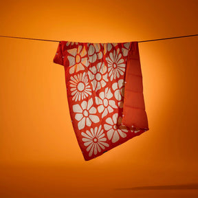 Graphene Puffer Blanket: Big Flowers Expedition Orange Nomadix