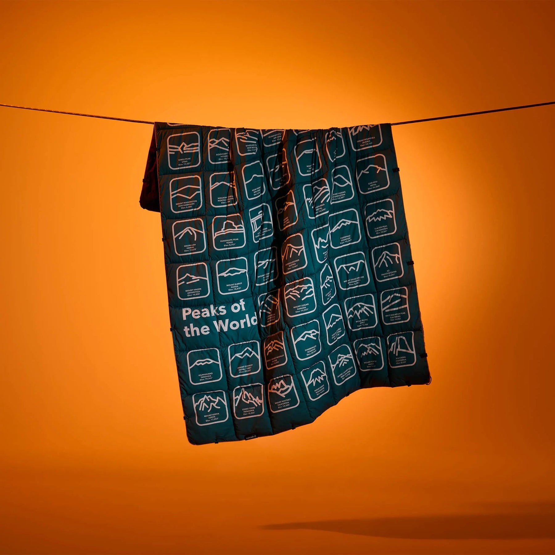 Graphene Puffer Blanket: Peaks of the World Teal Ocean Nomadix
