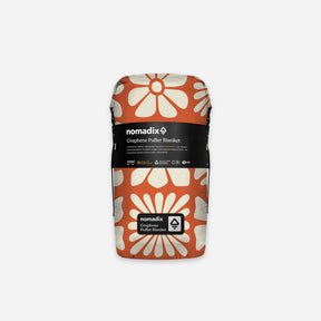 Graphene Puffer Blanket: Big Flowers Expedition Orange Nomadix