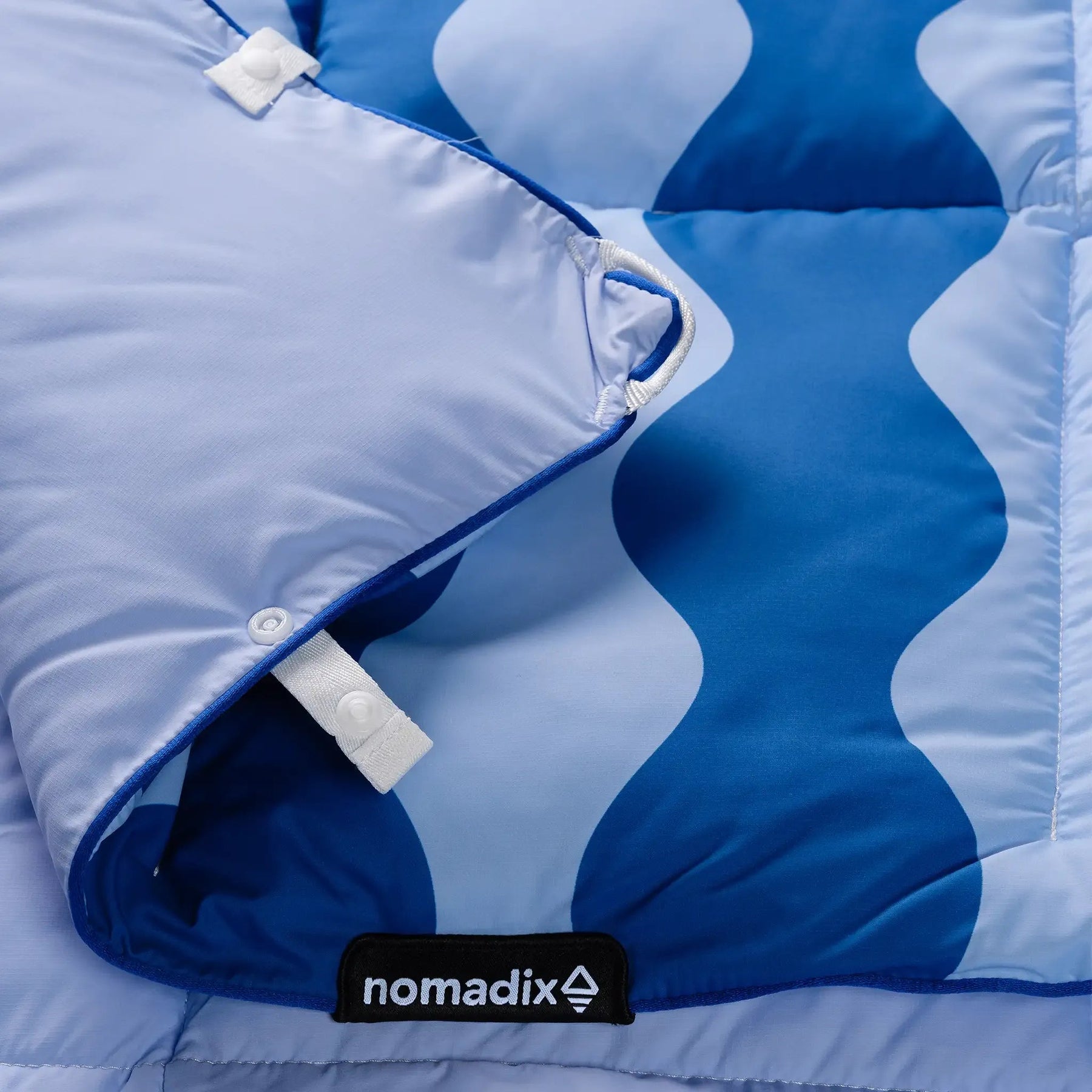 Graphene Puffer Blanket: Slack Tide Coastal Blue Nomadix